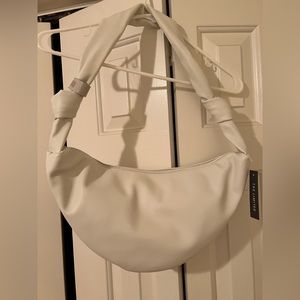 The Limited Leather bag. Very soft material. Brand new.